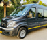 9 12 seater force urbania luxury van hire delhi - logo